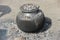 A big cauldron Handi Daig on ground for cooking food on large scale