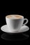 Big ceramic cup of cappuccino isolated on black