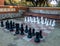 BIG chess in the park. Large chess game on ground in the camping