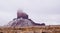 Big Chief at Monument Valley Navajo Tribal Park disappears in the low hanging clouds