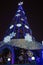 Big Christmas outdoor pine tree with light decoration