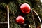 Big Christmas tree red glass balls decoration with reflection of city square