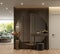 Big circle mirror in modern home interior. Entrance or hallway with mirror and decoration.