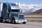 Big classic semi truck on mountains background