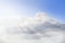 Big cloud on a background of blue sky over the sea, with sunrays, Athens, Greece