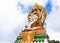 Big colorful buddha statue sitting thai temple