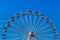 Big colourful ferris wheel in amusement park