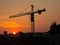 Big construction crane on a golden sunrise light in Belgrade