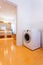 Big contemporary bathroom with washing machine in the corner