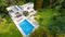 .Big contemporary villa with pool, aerial view