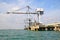 Big crane at harbour for load coal