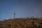 Big crucifix on Radobyl hill over Labe river in norht Bohemia in winter morning