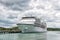 Big cruise ship, white luxury yacht in sea port, Antigua