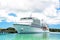 Big cruise ship, white luxury yacht in sea port, Antigua