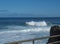 BIg crushing white wave over the Atlantic Ocean seen from terrace at la Fajana, La Palma, Canary Islands, Spain. Blue