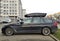 Big elegant classic estate station wagon hatchback car BMW 520d parked