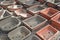 Big empty bonsai pots on garden stones