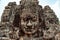 Big face and two small faces in Angkor Wat