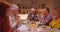 Big family dinner prayer together reunion different generations