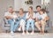 Big family, grandparents and children on sofa in living room for holiday, baby language communication learning and love