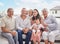 Big family portrait, children with grandparents at summer holiday vacation on sofa with blue sky. Happy Mexico mother