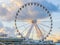 Big ferris wheel attraction at the pier of Scheveningen beach Holland a well-known and touristic town