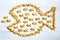 Big fish eats little fishes abstract concept illustrated with small crispy cookies on white wooden background