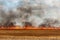 Big flames in an harvested field