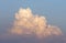 A big and fluffy cumulonimbus cloud in the blue sky