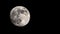 Big full Moon with craters. Isolated black night sky without stars. View in telescope telephoto lens. Astro or astronomy photograp