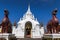 Big gate white in to wat phra that hariphunchai temple thailand