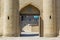 Big gates of Medieval Mausoleum of Khoja Ahmed Yasawi in the city of Turkestan, Kazakhstan. Silk Road Legacy Tour