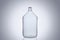 Big glass water bottle demijohn isolated on white background