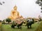 Big gold buddha statue at Wat Muang, Angthing, Thailand. Beautiful of historic city at buddhism temple