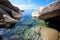 Big granite boulders at pristine lake shore