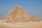 Big Great Cheops Pyramid and the Pyramid of Khafre behind the Pyramid of Menkaure  and pyramids of Queens