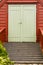 Big green oldfashioned wooden doors in house