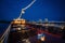 Big illuminated cruise ship floating at night