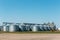 Big industrial Silo Storage Tanks on blue sky background