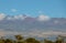 Big Island, Hawaii. Mauna Kea Summit Observatories covered by snow is viewed from the Saddle Road