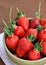 Big, juicy strawberries in a bowl