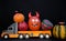 big kids toy truck loaded with lots of beautiful orange pumpkins