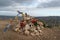 Big landmark on top of Cabezo del Sillon with a Virgin del Pilar, offerings and Buddhist flags in Maria de Huerva, Zaragoza, Spain