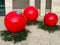 Big little things: Christmas balls- x-mas balls - in bright red with fir green on townhouse square in Ratingen, Germany