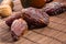 Big luxury dried date fruit on the bamboo mat, kurma ramadan kareem concept, close up