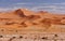 The Big Mamma Sand Dune of Namib desert, near Sossusvlei, Namibia. Photographed from Deadvlei dunes.