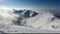 Big mountain over clouds form in a valley