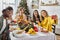 big multiracial family taking joyful selfie