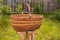 Big old weathered empty wicker laundry basket