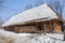 Big old wooden shed with straw roof